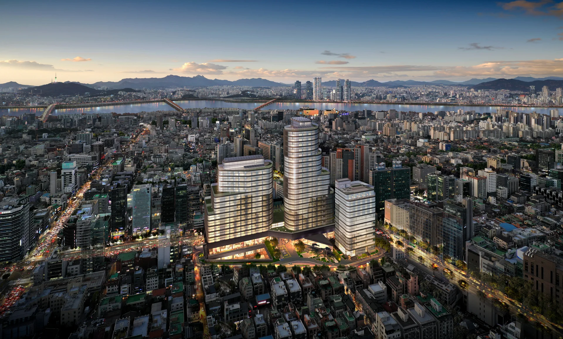 원에디션 강남 조감도 — 해 질 녘 한강과 남산을 배경으로 불을 밝힌 곡선 외관 3개 동